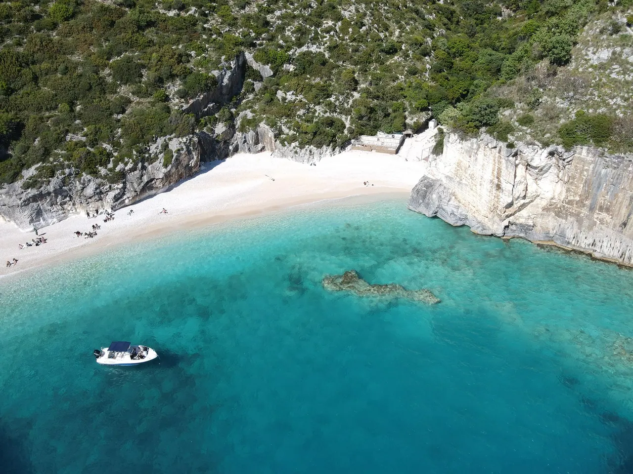 Boats moored at Gramma Bay — drone shot