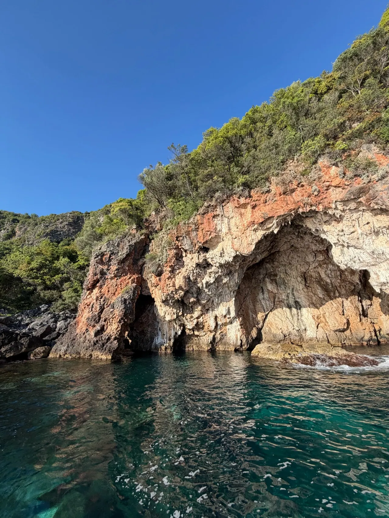 Approaching Pirates Cave by boat